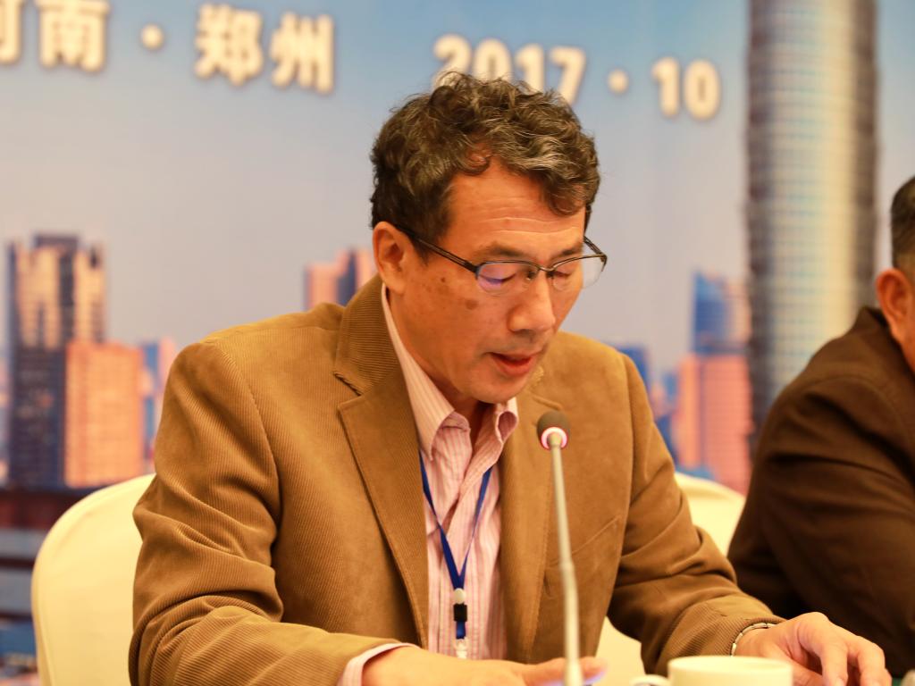 研究会会长,我校副校长李俊生作工作报告